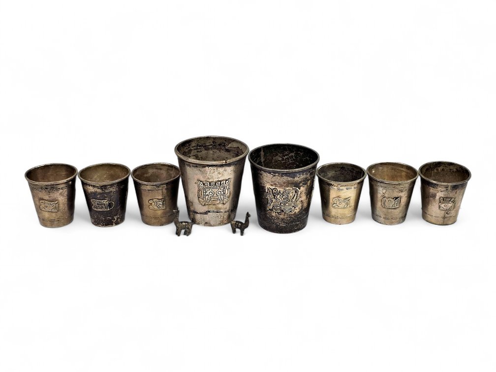 Eight Andean-Style Cups, Including a 900-Marked Bolivian Llama-Footed Cup