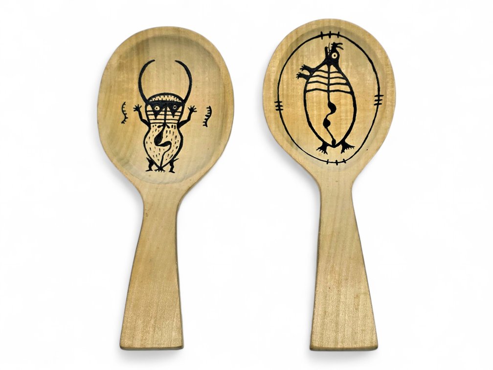 Two Decorated Yup'ik Wooden Spoons