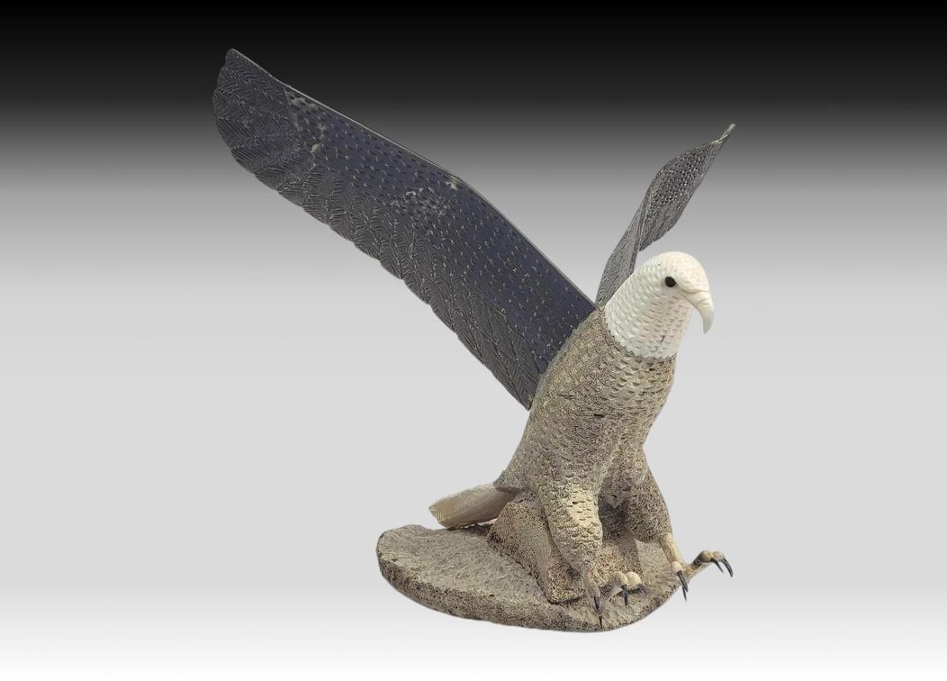Roger Silook, Sr. Baleen, Ivory, & Fossilized Whalebone Eagle Sculpture