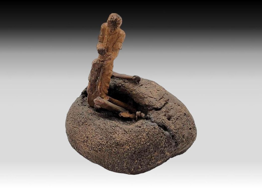 Fossilized Ivory on Whale Bone Prospector Sculpture