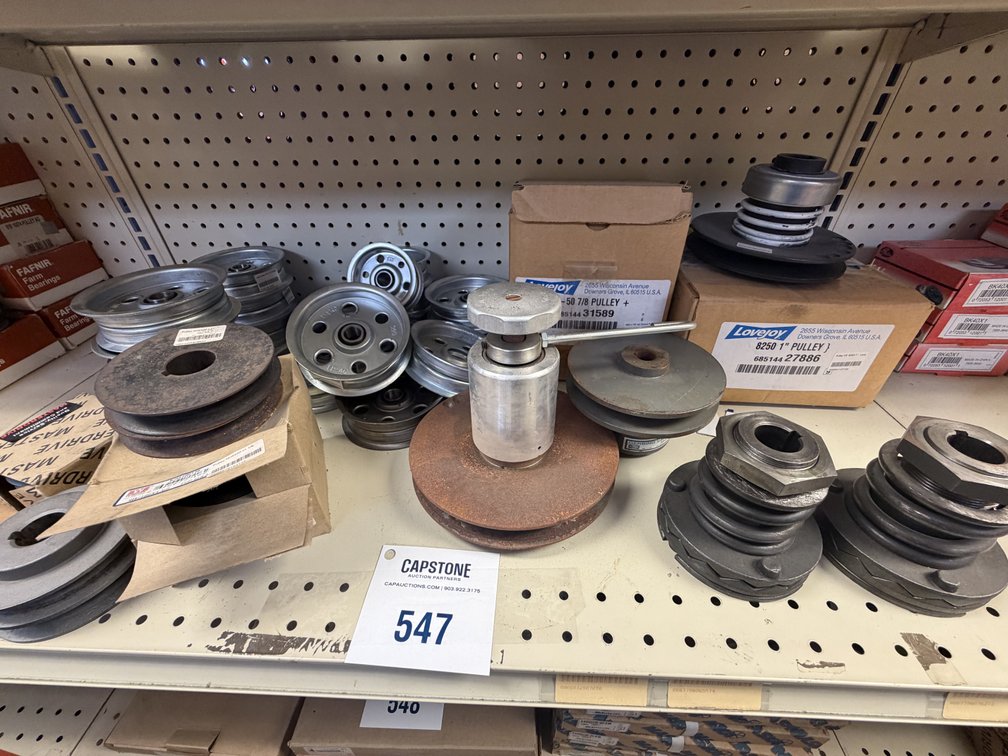 Assorted Industrial Pulleys Including Lovejoy Variable Speed and MasterDrive