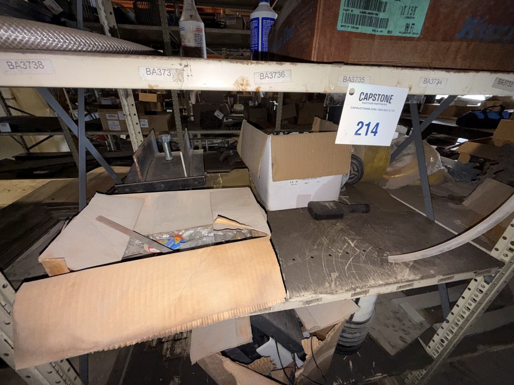 Multi-Tier Industrial Steel Utility Shelving Unit with Assorted Warehouse Contents