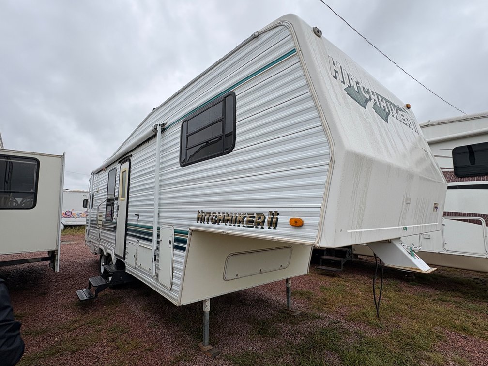1996 Hitchhiker II by Nu-Wa - Fixer Upper, 1-30lb LP Tank, 16' Awning, 12' Slide, Tires Fair