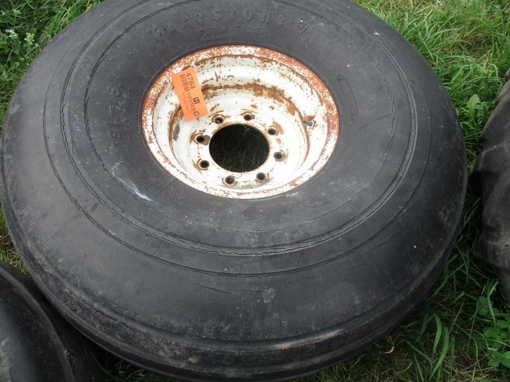 Firestone Tire with (8) Bolt Rim