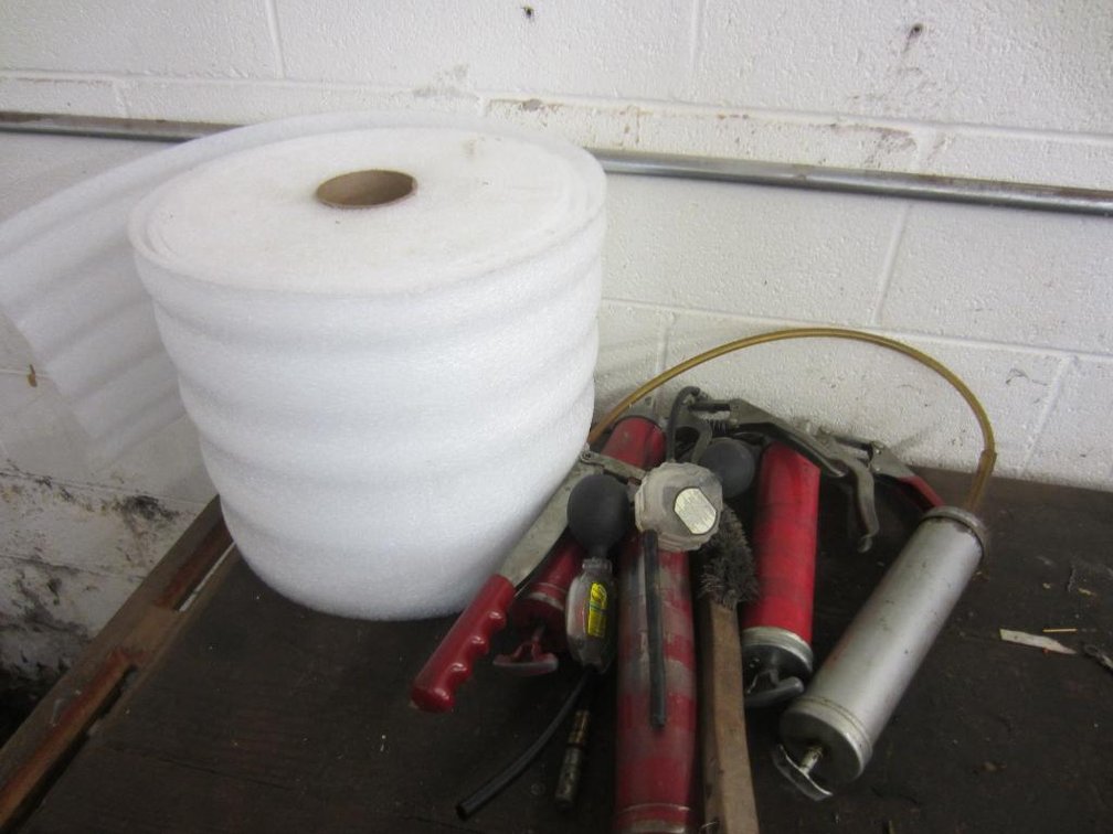 (4) Grease Guns and Roll of Styron-Foam
