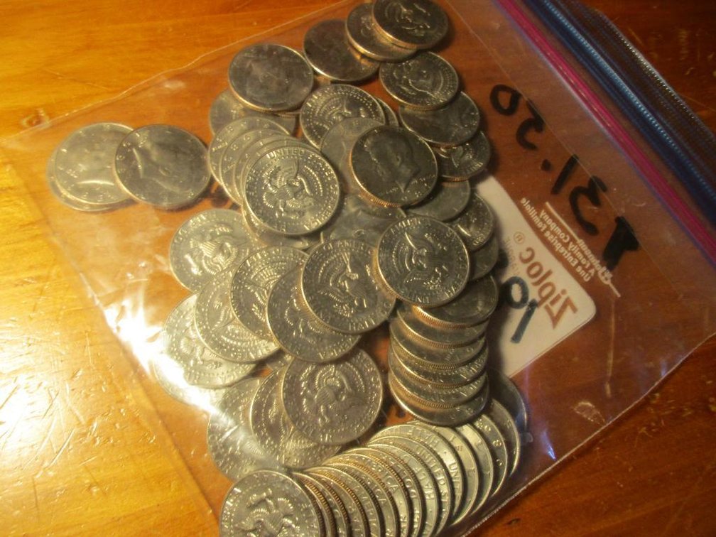 (63) Half Dollars