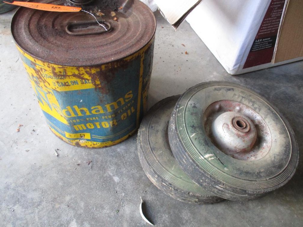 Vintage Oil Can and Dolly Wheels