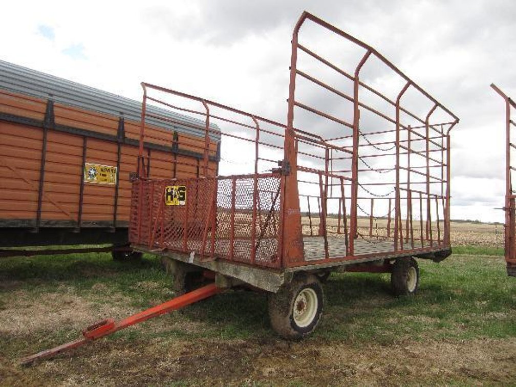 H&S 16FT STEEL HAY RACK ON RUNNING GEAR