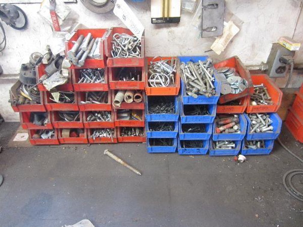 RED AND BLUE HARDWARE BINS WITH HARDWARE