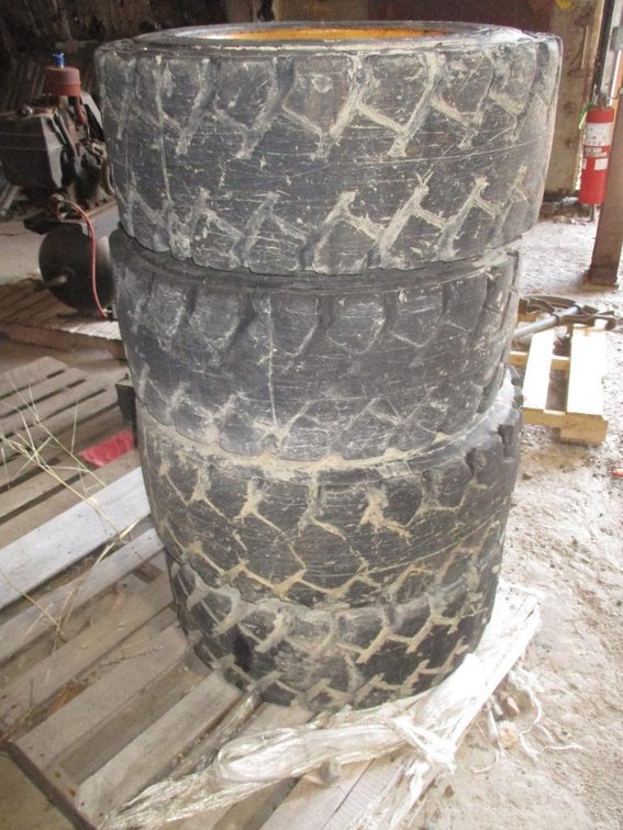 Set of (4) Foam Filled Skid Steer Tires on 8 Bolt Rims