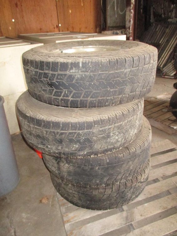 Set of (4) Tires on 8 Bolt Rims
