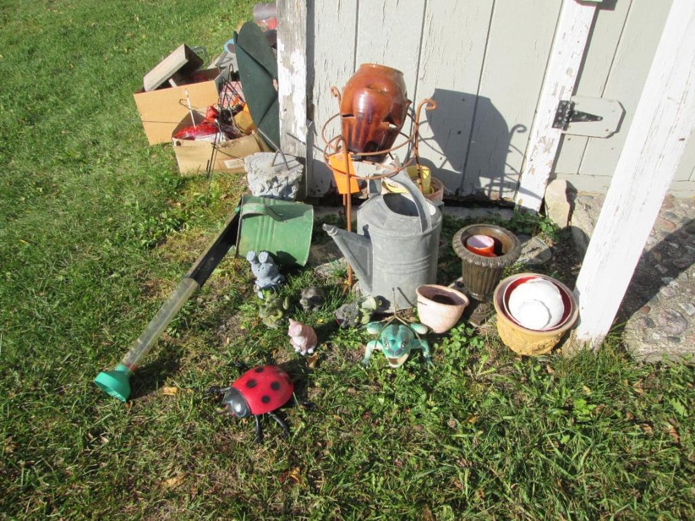Galvanized Watering Cans and Lawn Art