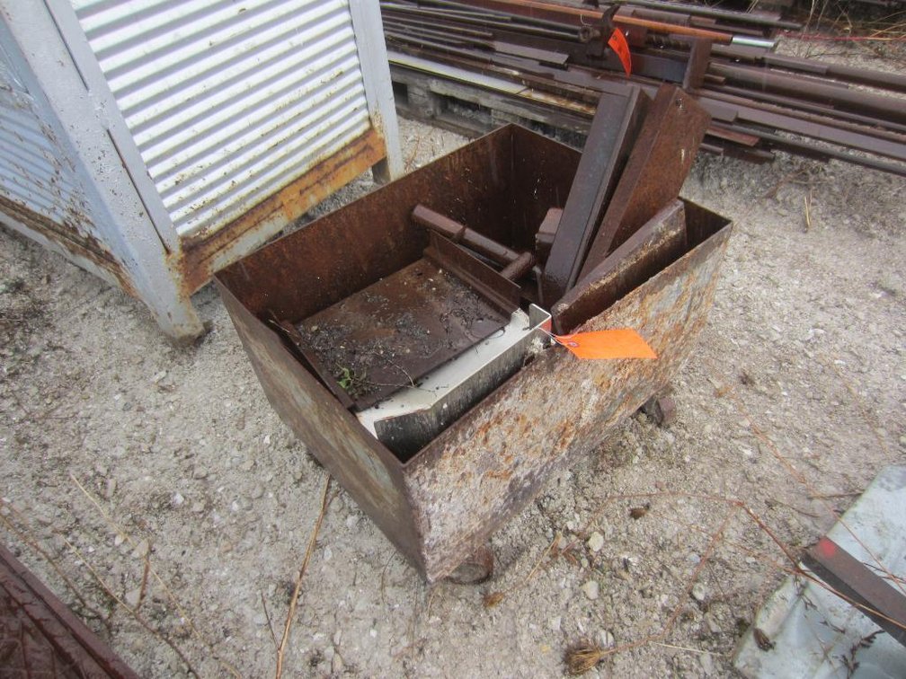 Metal Box with Scrap Steel on Wheels