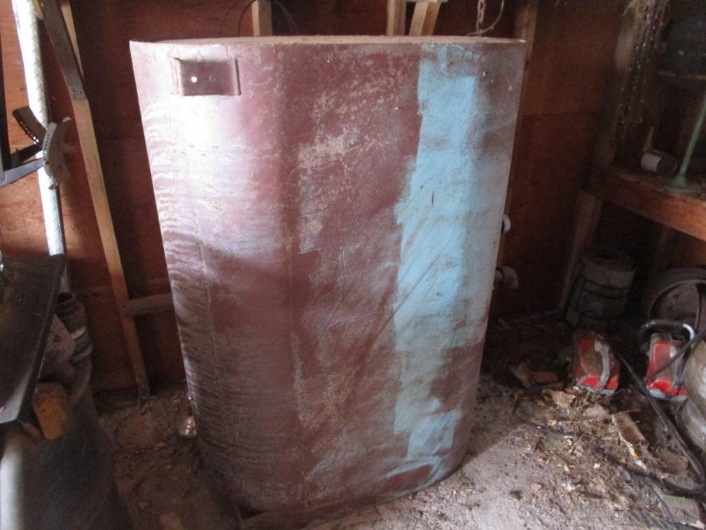 Large Metal Fuel Oil Tank and 55-Gallon Metal Barrel
