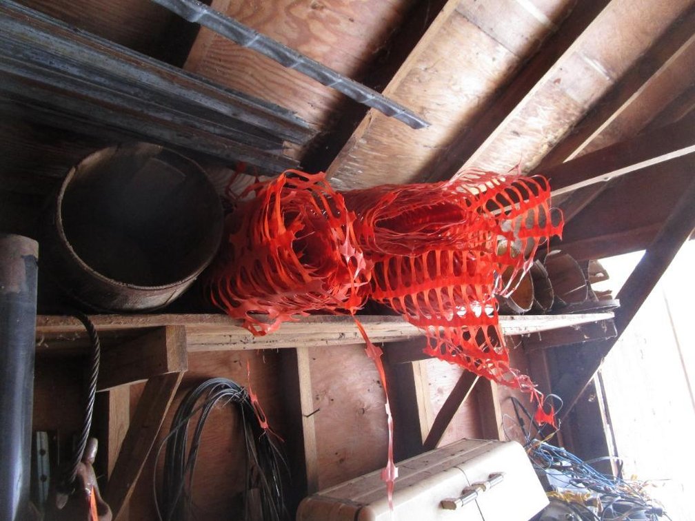 Contents of Shelf, Includes Orange Fence, Wooden Kegs, Cable and More