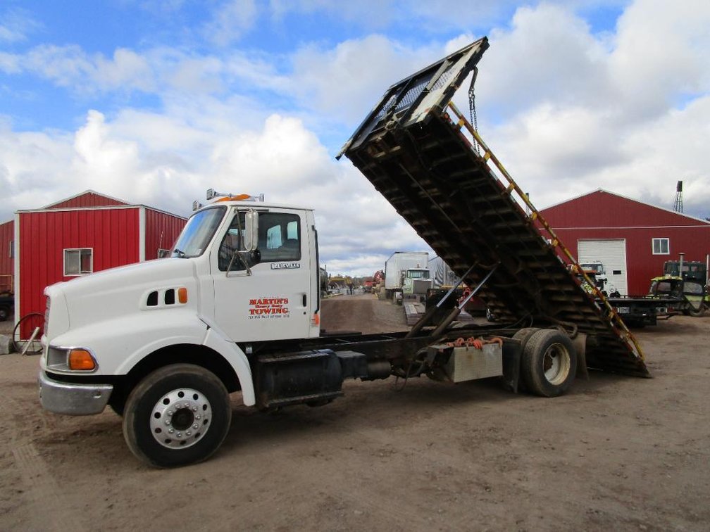 1997 Ford Louisville Roll Back Truck