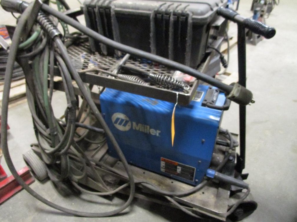 Miller XMT304 CC/CV DC Inverter Arc Welder with Cart and Welding Equipment
