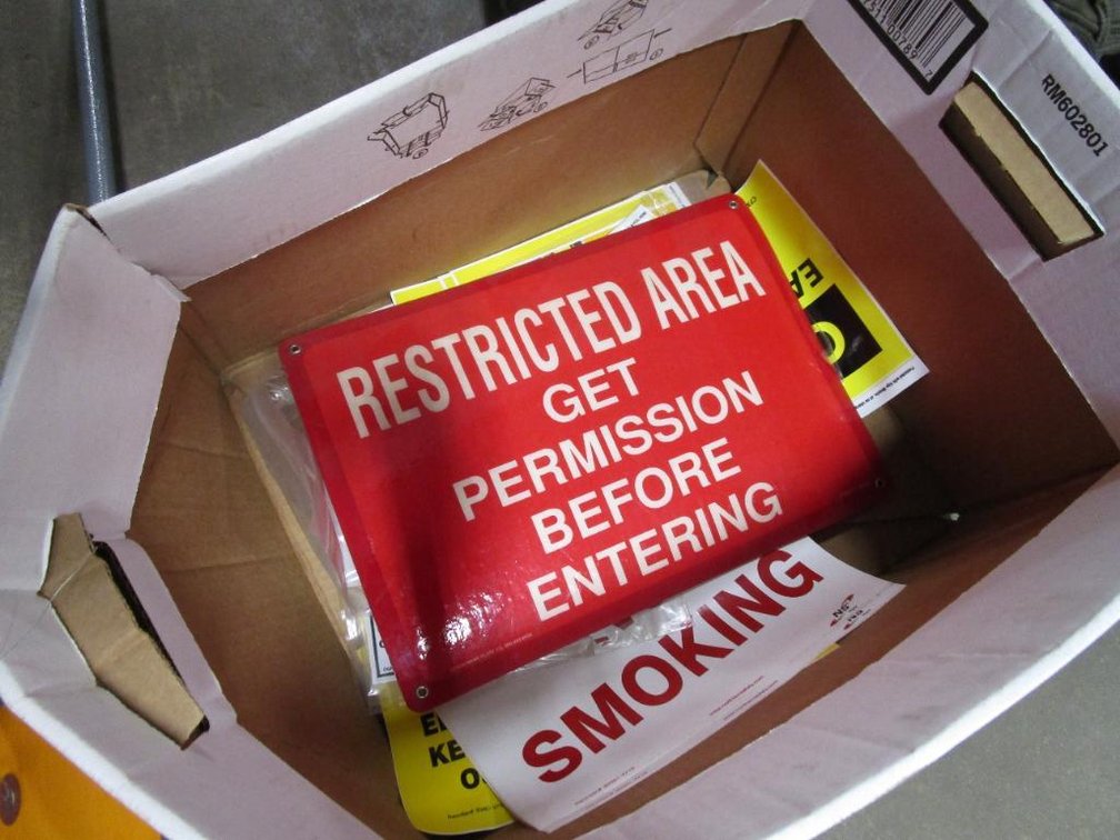 Various "Caution" and "Restricted Area" Signs