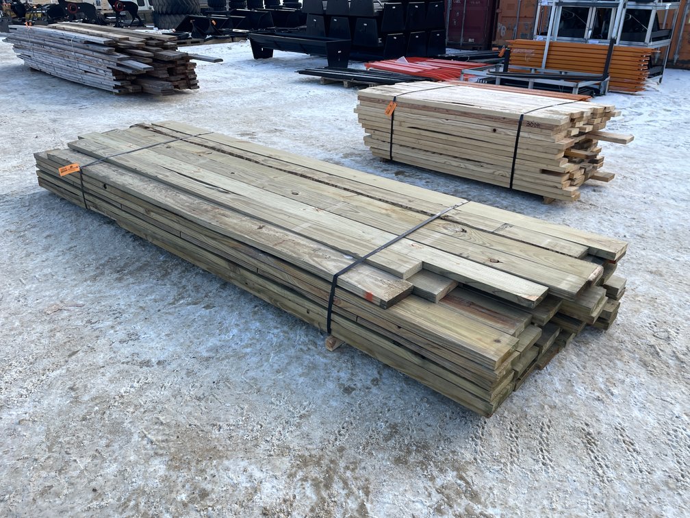 Bundle of Green Treated Lumber