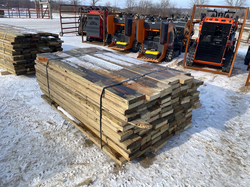 Bundle of Green Treated Lumber