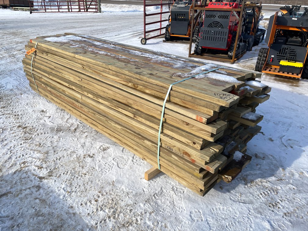 Bundle of Green Treated Lumber
