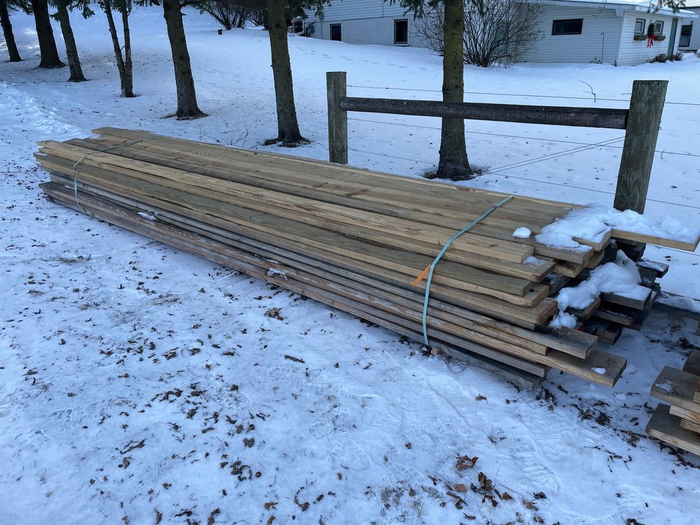 Bundle of Green Treated and Construction Grade Lumber