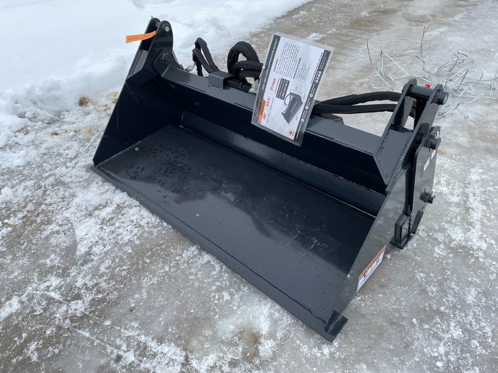 Wolverine Mini Skid Steer Combination Bucket