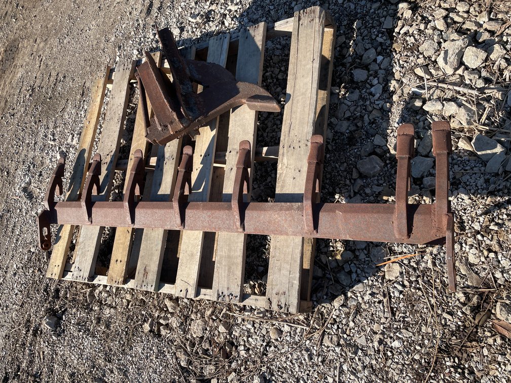 Bucket Tooth Bar and Ripper Attachment