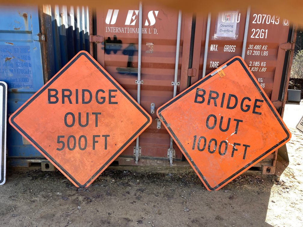 (2) Metal Retired Road Signs