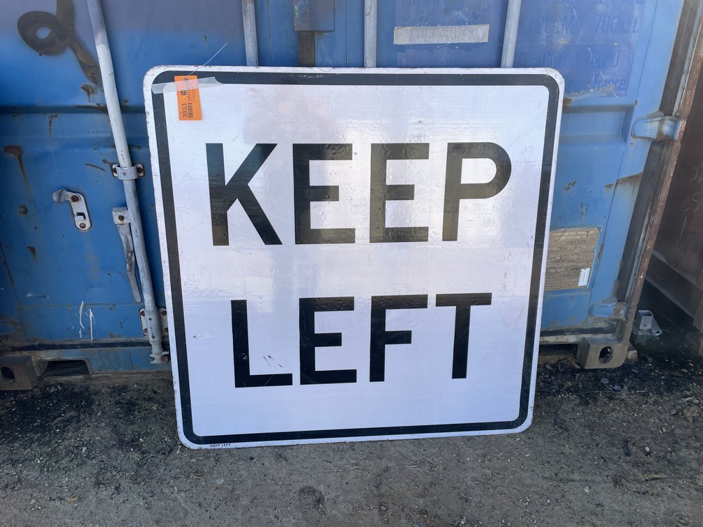 Retired White Fiberglass Road Sign