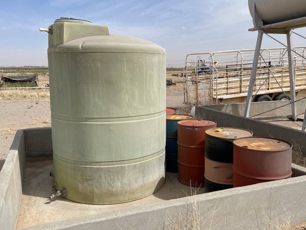 55-Gallon Drums and a 1000-Gallon Tank
