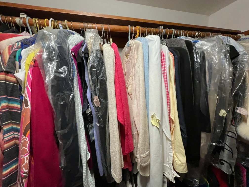 Clothing and Shoes on Right Side of Closet