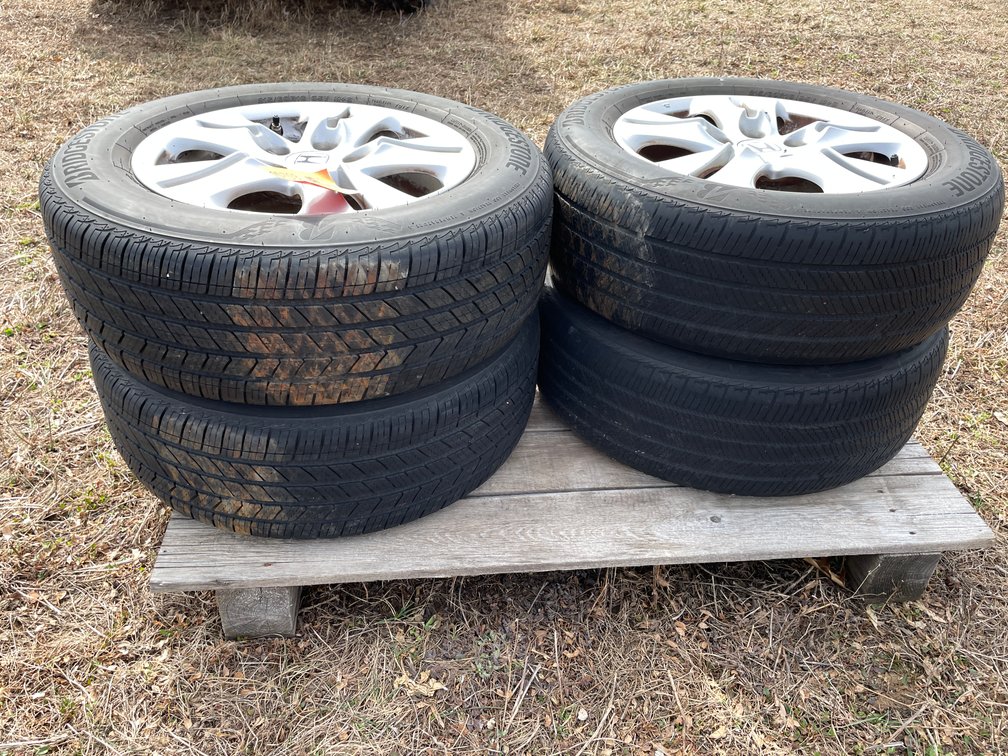 (4) Bridgestone 16" Tires on Honda 5-Bolt Aluminum Rims