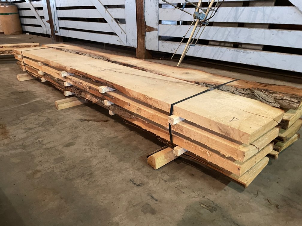 Stack of Live Edge Pine Lumber