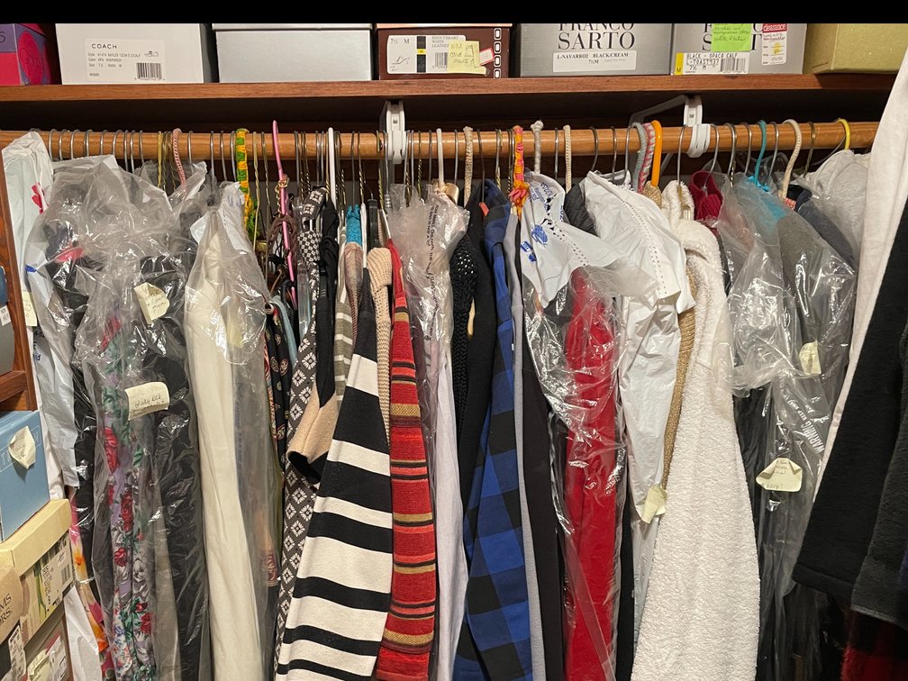 Clothing and Shoes on Back Wall
