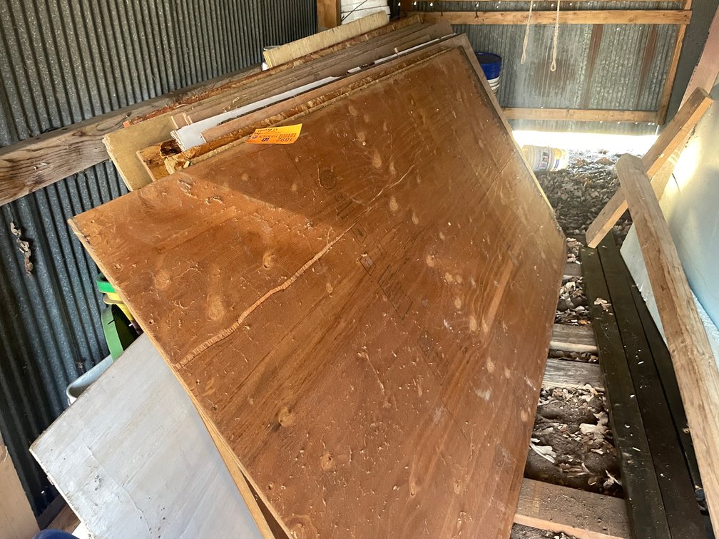 Sheets of Plywood and USB and 5-Gallon Buckets