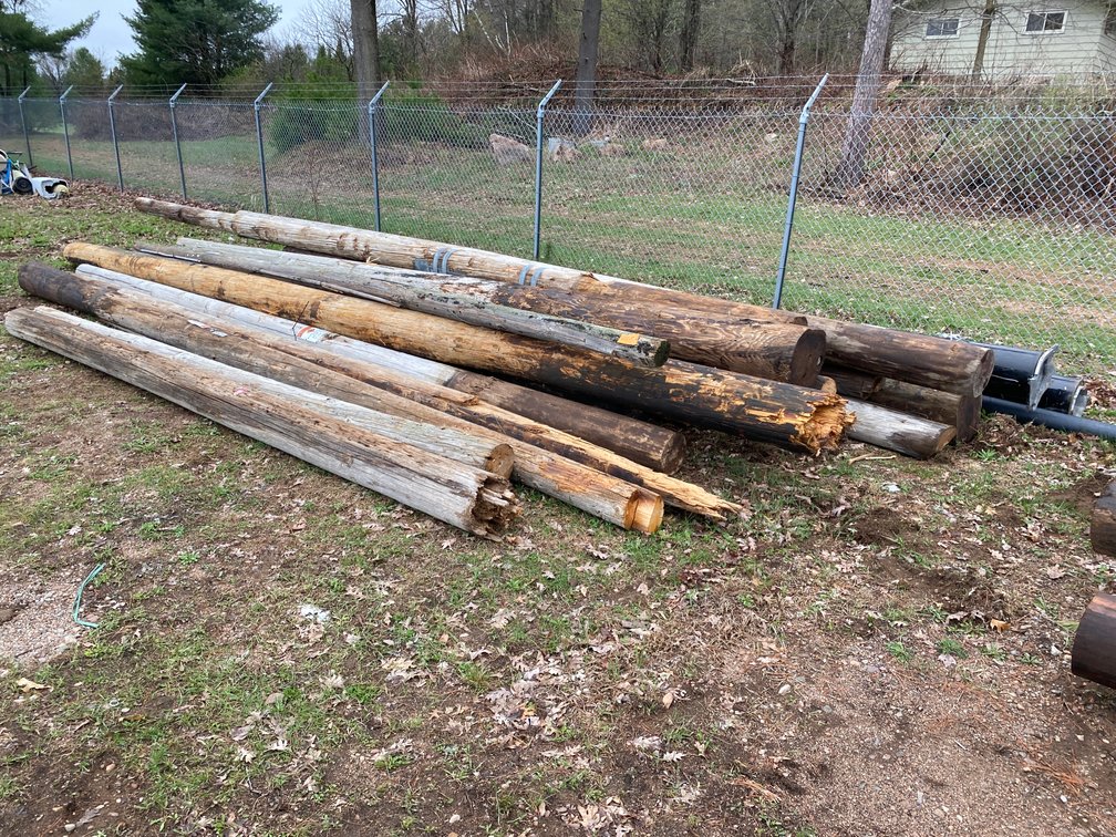 (19) Wooden Utility Poles