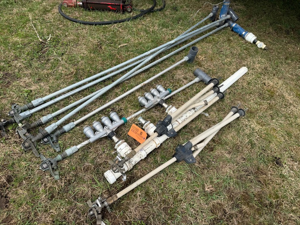 Assortment of Sprinkler Heads on Stands