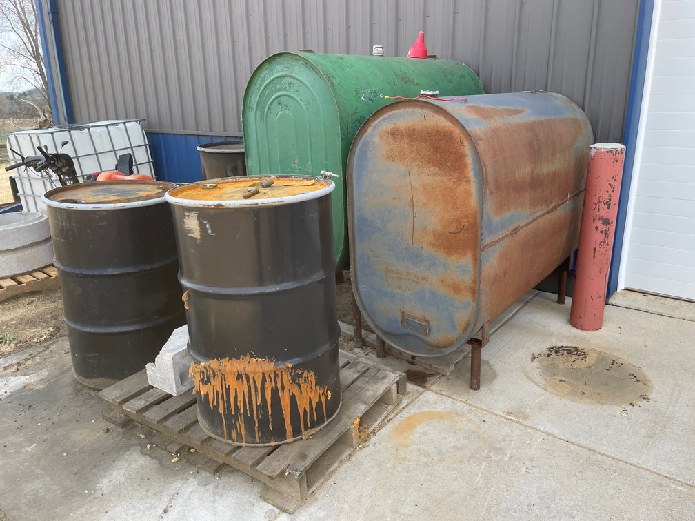 (2) Metal Tanks and (3) Barrels