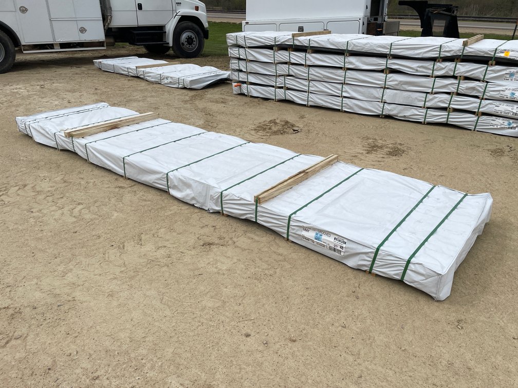 Bundle of Venture Gray Slotted Composite Deck Boards