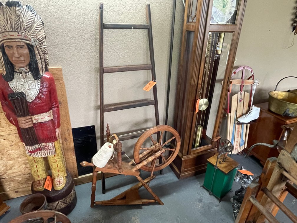 Wooden Spinning Wheel and Vintage Ladder