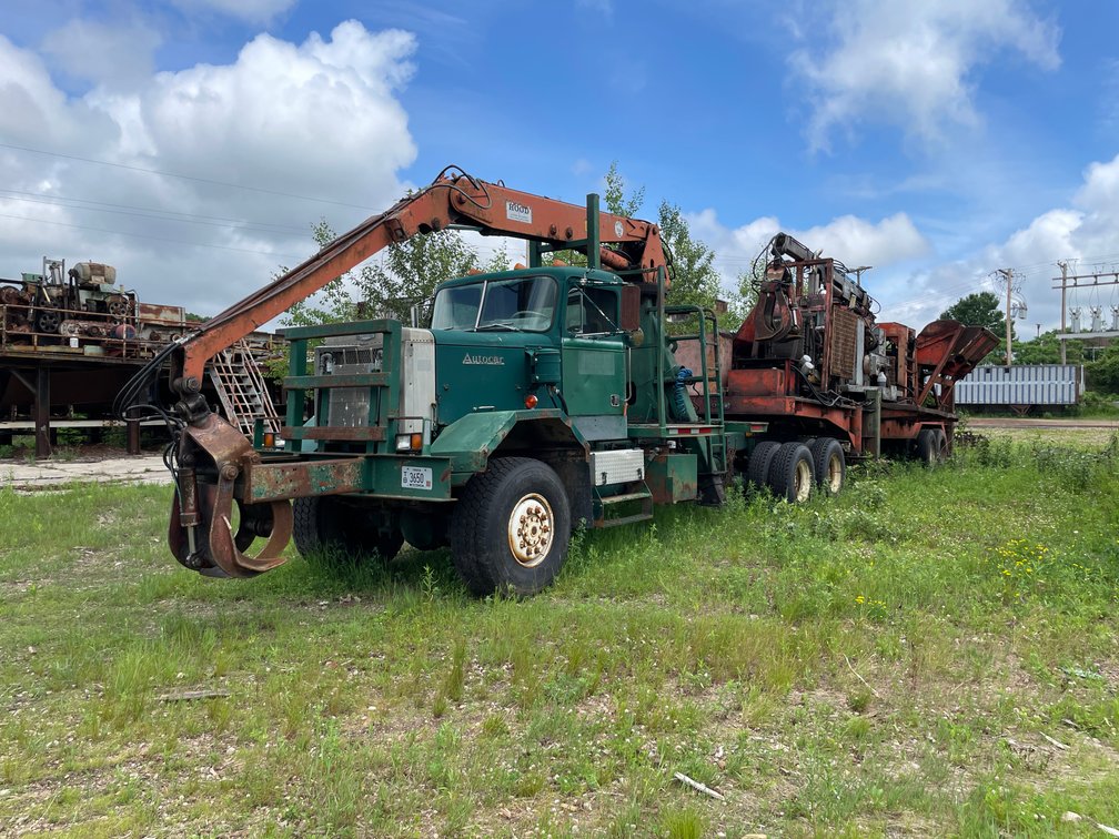 Autocar Semi With Grapple and Mobile Debarker (No Title)