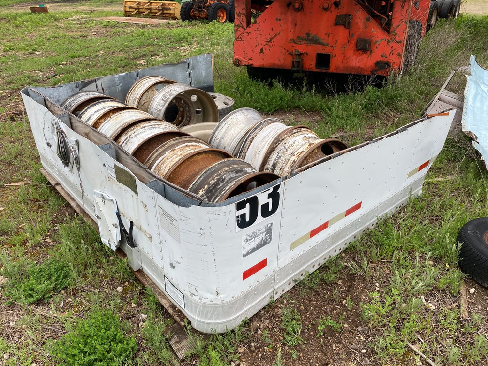 (14) Semi Trailer Rims and Pile of Scrap Metal