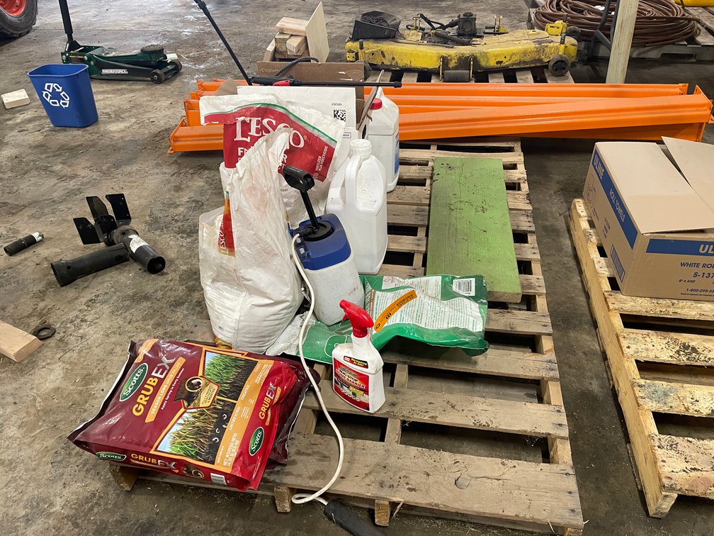 Pallet of Various Insecticides and Fertilizer
