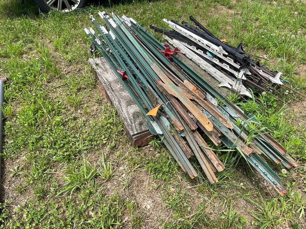 Assortment of T-Posts and Screw In Anchors