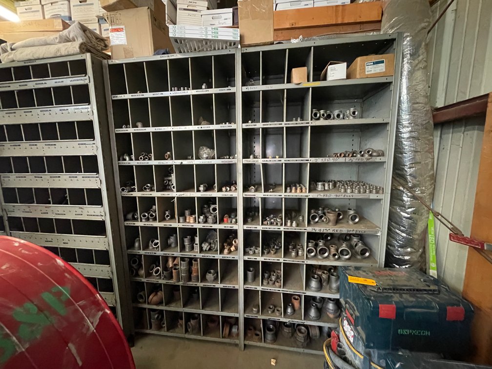 Large Metal Organizing Rack with Various Pipe Fittings