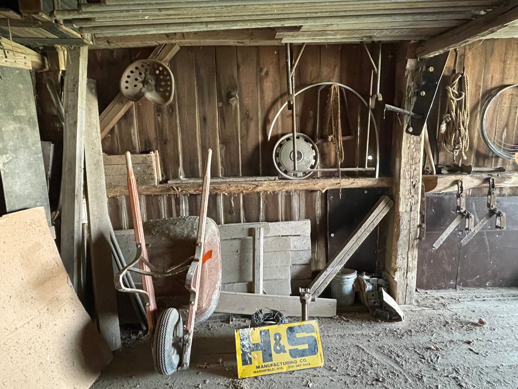 Wheelbarrow, Barb Wire, Tractor Seat, and More