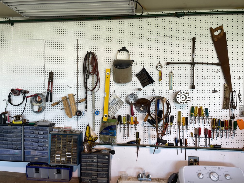 Tools Hanging on Peg Board