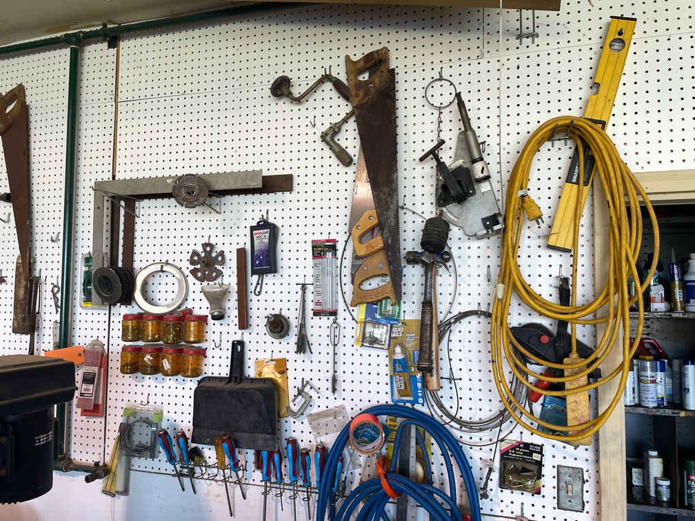 Tools and Hardware Hanging on Peg Board