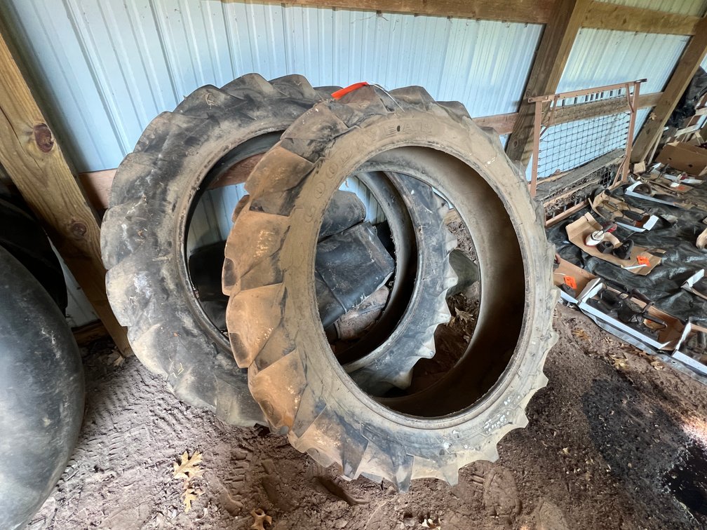 (1) Goodyear and (1) Firestone 11.2-36 Tires